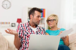 Confused Couple Doing Their Accounts 300x200